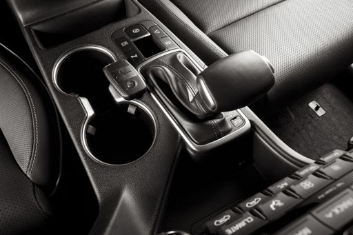 A closeup shot of a luxurious black interior of a modern elegant car