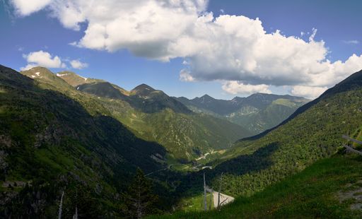A beautiful shot of a mountains landscape with a cloudy day background