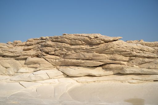 A beautiful shot of marble rock formations under the blue sky