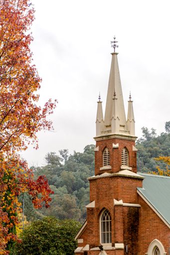 A vertical shot of the Anglican brick church in small town, Victoria, Australia
