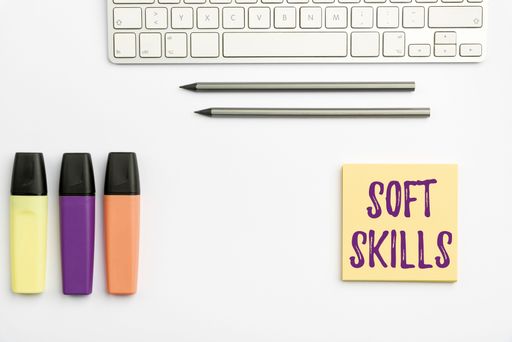 A closeup of flashy school office supplies with text caption presenting soft skills