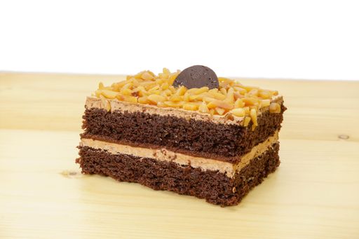A slice of chocolate cake on the wood background