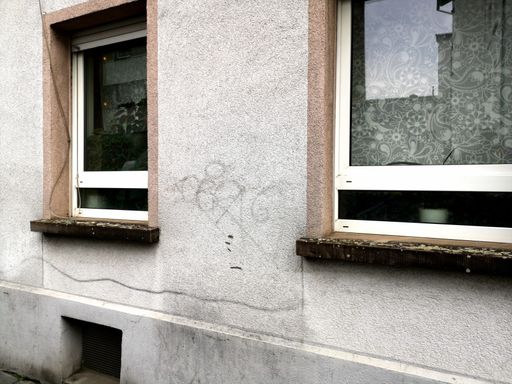 A view of glass window frames and windowsill