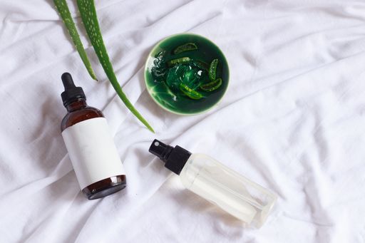 Product mockup of aloe vera spray and serum showing natural and eco-friendly beauty and body care product