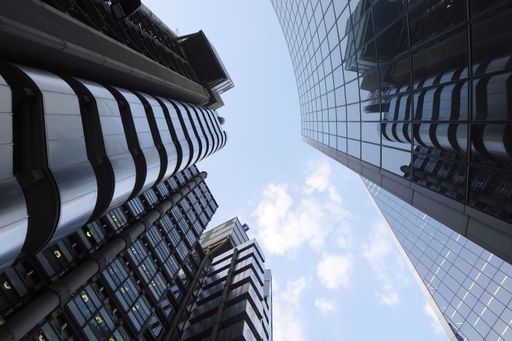A low-angle shot of the Lloyds of London insurance market building