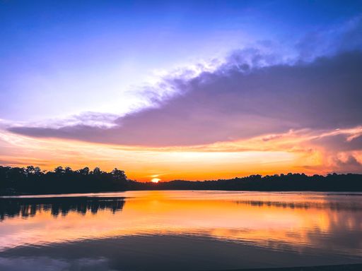 Vibrant sunset view over MacRitchie Reservoir, Singapore