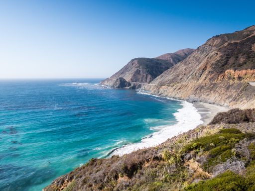 A panoramic shot of rocky shores of the Julia Pfeiffer Burns State Park Slates in  USA