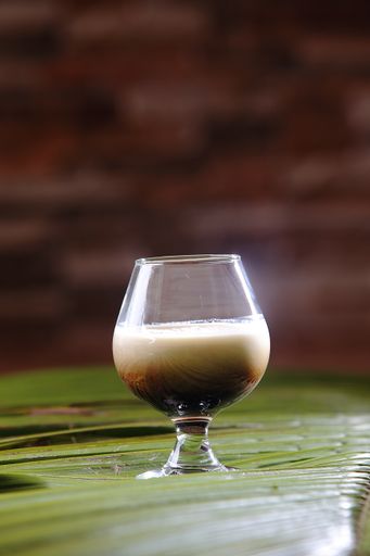 A White Russian is a cocktail made with vodka, coffee liqueur and cream served with ice in an Old Fashioned glass