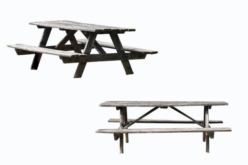 two wooden picnic benches isolated on white background