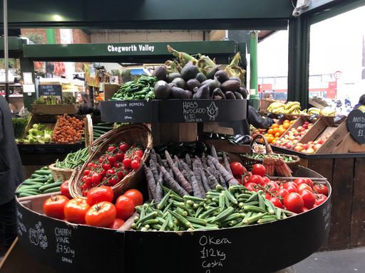 A closeup of assorted vegetables at a shop in borough market in London, United Kingdom