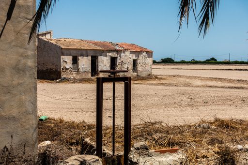 An abandoned stone house on dry land in Valencia, Spain