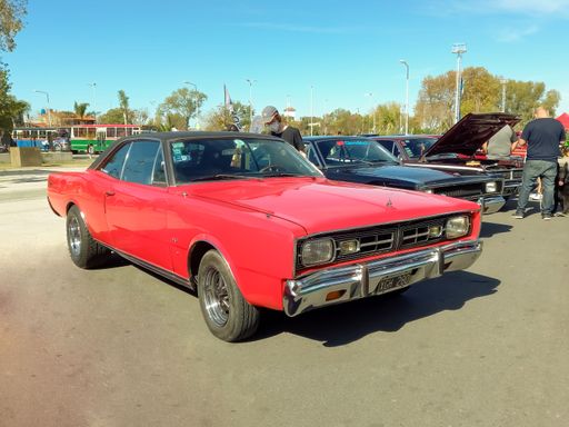 Old 1970 Dodge GTX 2 door red convertible coupe. Sporty muscle car by Chrysler. Expo Fierro 2022 classic car show