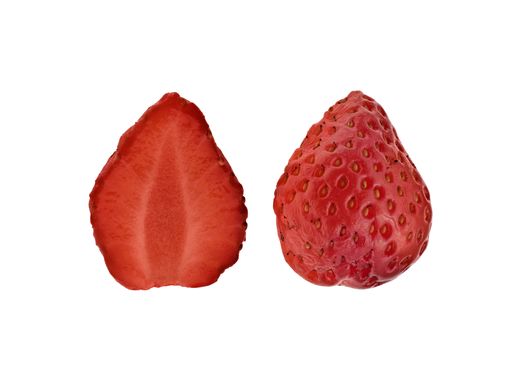 A sliced strawberry isolated on white background