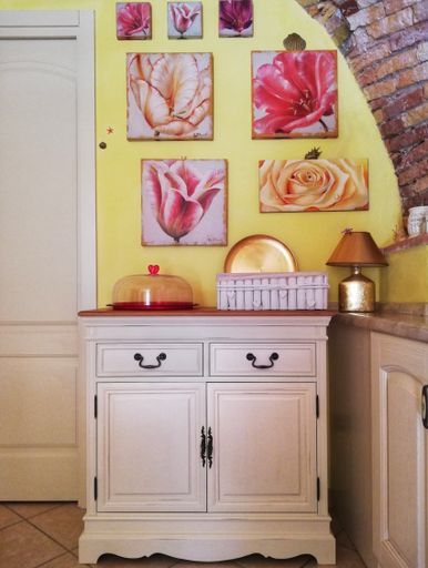 A vertical shot of Shabby chic furniture in a rustic home