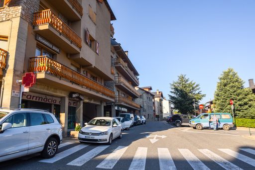 Alp, Spain : 2020 19 July : Main street behind the Church of Parroquia de Sant Pere in Summer. Alp, Spain  on July 2020 in summer
