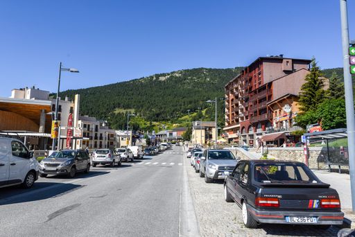 Alp, Spain : 2020 19 July : Main street behind the Church of Parroquia de Sant Pere in Summer. Alp, Spain  on July 2020 in summer