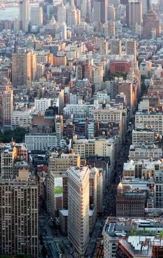 A vertical shot of skyscrapers in Manhattan on a sunny day in New York