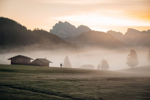 The beautiful view of sunrise and fog in Seiser Alm, South Tyrol