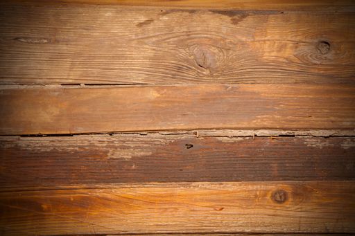 A closeup shot of a wooden surface with a copy space