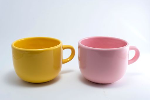 A closeup shot of beautiful cups isolated on the white background