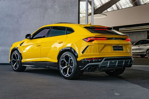 A Yellow Lamborghini Urus SUV, Rear View