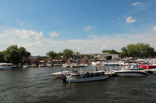Some boats on a beautiful lake taken in Iowa