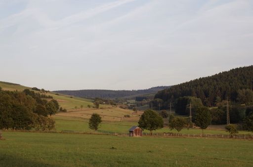 A beautiful rural countryside with mountains during golden hour in Hildfeld, Sauerland, Germany