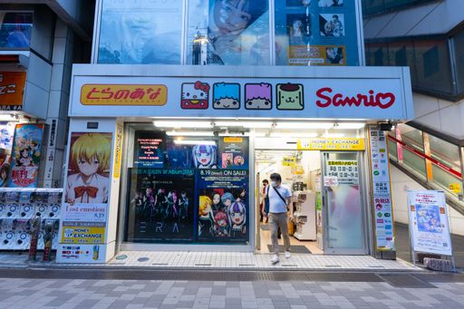 Akihabara, Japan- September 5, 2020: A man walks out of an anime shop in Akihabara.