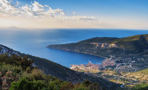 An amazing high angle panoramic view of Komiza town facing the Adriatic Sea taken from Island Vis in Croatia