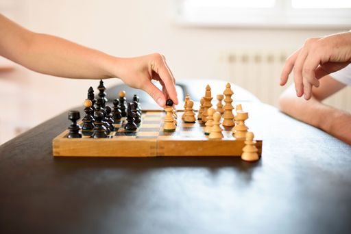 A two players playing a game of chess