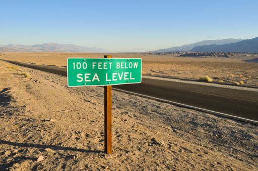 The Querky roadsign showing below sea level and open roadtrip. Death Valley, USA