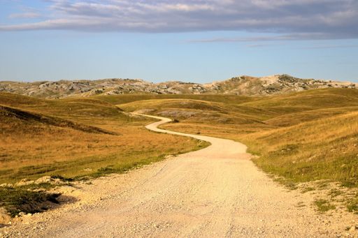 A beautiful shot of a dirt trail on a rural valley in Morine, Bosnia and Herzegovina