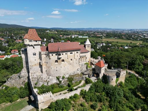 Drone footage of the Burg Lichtenstein, which is a castle on a hill, built in 1130, located in Austria near Perchtoldsdorf.