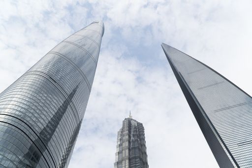 Beautiful bottom view of the tallest buildings in Shanghai. Shanghai tower, Jin Mao and Shanghai World Financial Center.