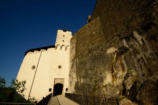 A low angle shot of a tall castle