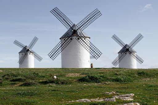 Three windmills in a valley in Toledo, Spain