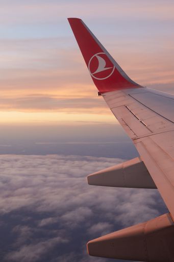 Turkish airline plan from Zagreb to Istanbul at Croatian cloudy sky at sunset