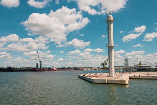 A tall tower in port of Antwerp, Flanders, Belgium on a sunny day