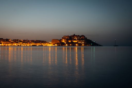 A small town of Calvi at sunset in Corsica, France