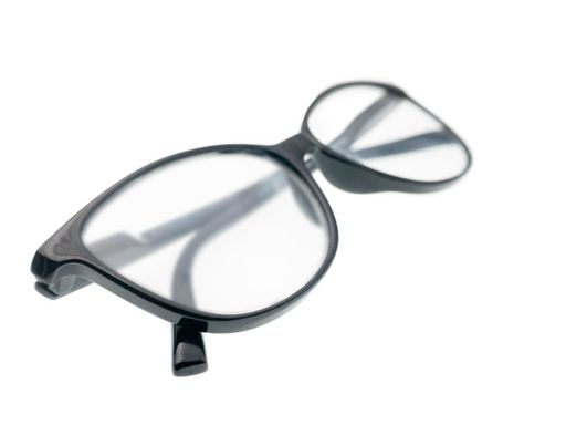 A closeup shot of optical glasses on a white background