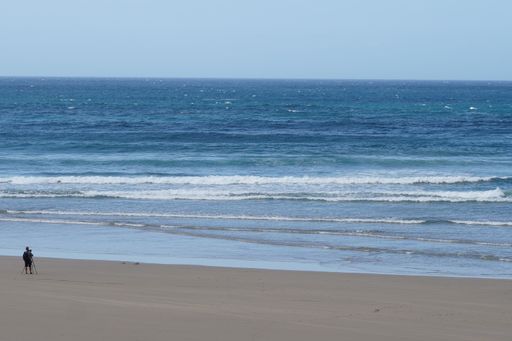 Surfer in beach of Galicia, A Coruna. Spain. Europe