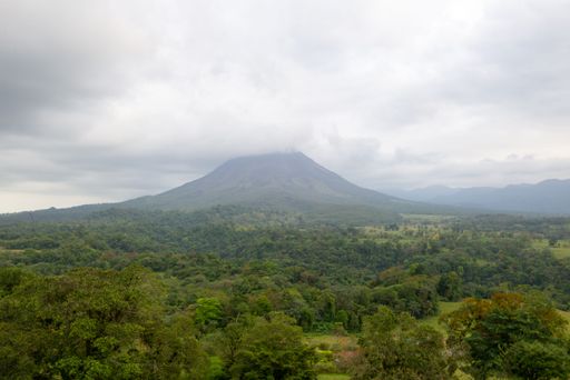 A Beautiful shot of Arenal Volcano under a cloudy sky