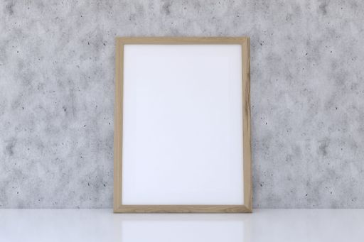 A 3D rendering of a mockup frame near a gray wall