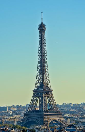 A vertical shot of the Eiffel Tower in daytime, Paris, France