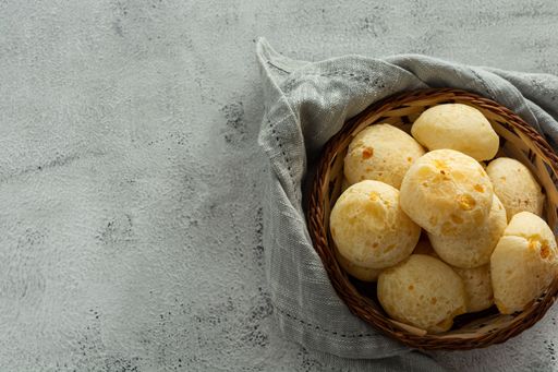 basket with cheese breads, or cheese bun, on stone table
