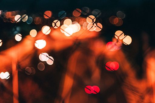A close-up shot of bokeh light in the dark