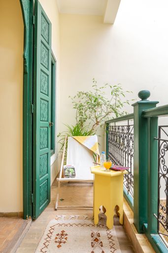 A vertical shot of a Moroccan-style balcony