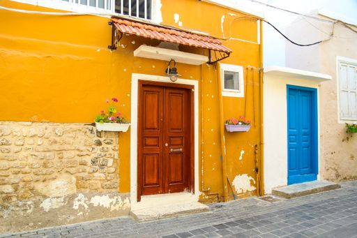 A yellow exterior wall of a building