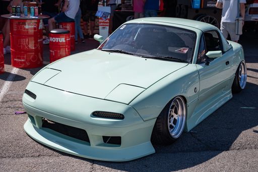 A front view of a tuned Japanese Mazda Mx-5 Miata sports car