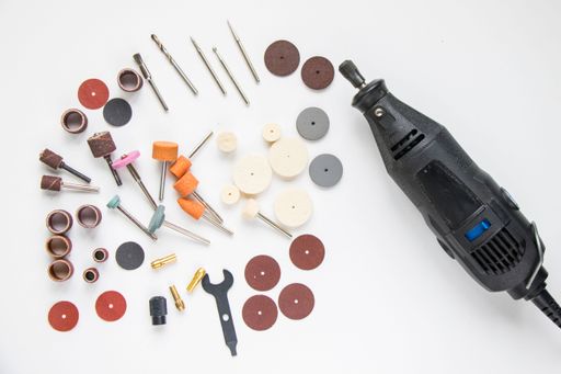 Different types gear with drill screws isolated on a white background